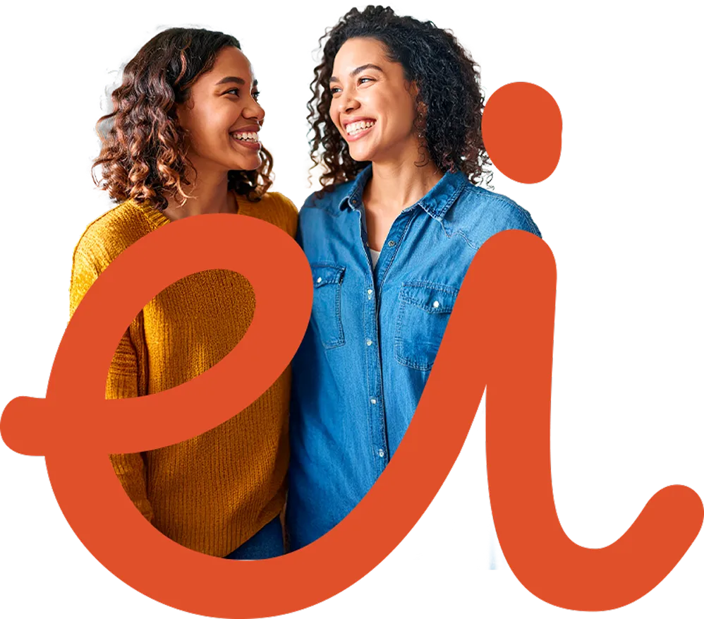 Professora abraçando uma aluna no programa Professor Inspirador 2025